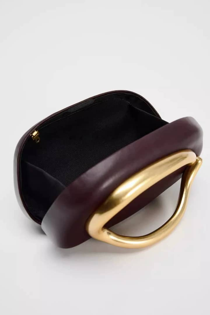 Gold clasped bag