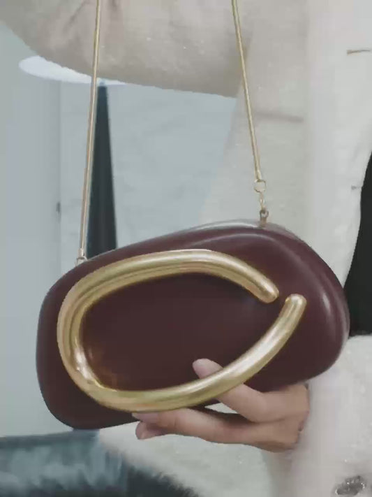 Gold clasped bag